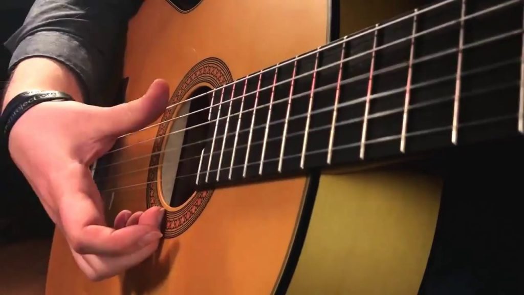 Tập làm quen và chơi đàn guitar